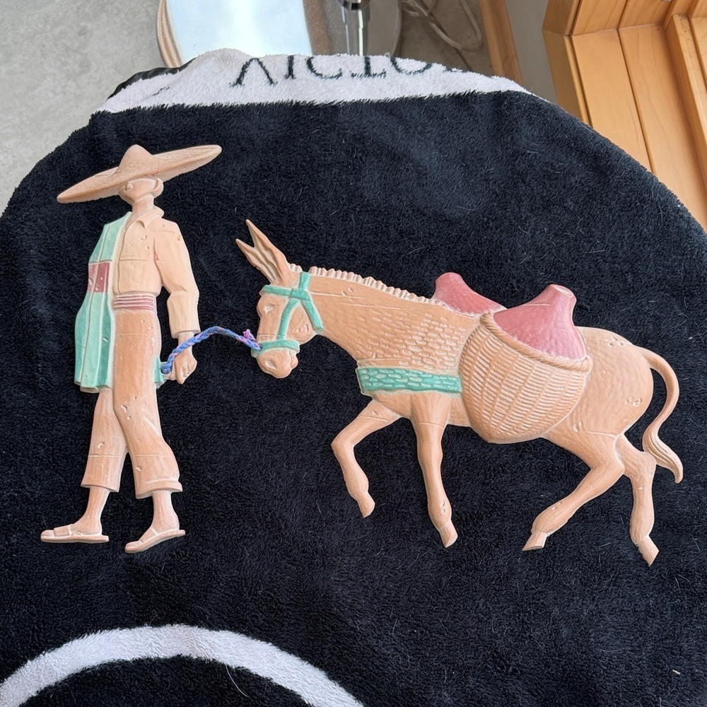Vintage Metal Wall Art with Man and Donkey southwestern design pastel color